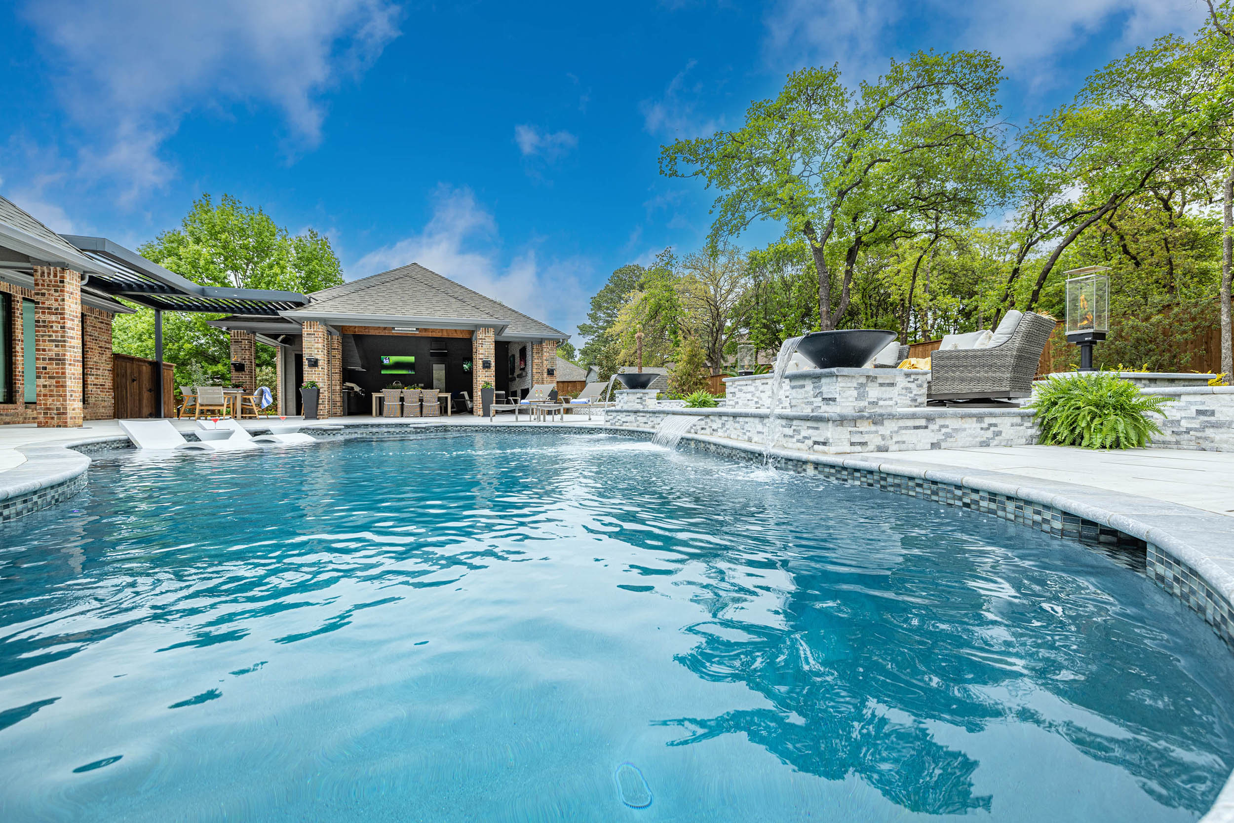 Birkenfeld_Pool cabana with full view of pool and outdoor seating areas with outdoor rated furniture in Keller Texas