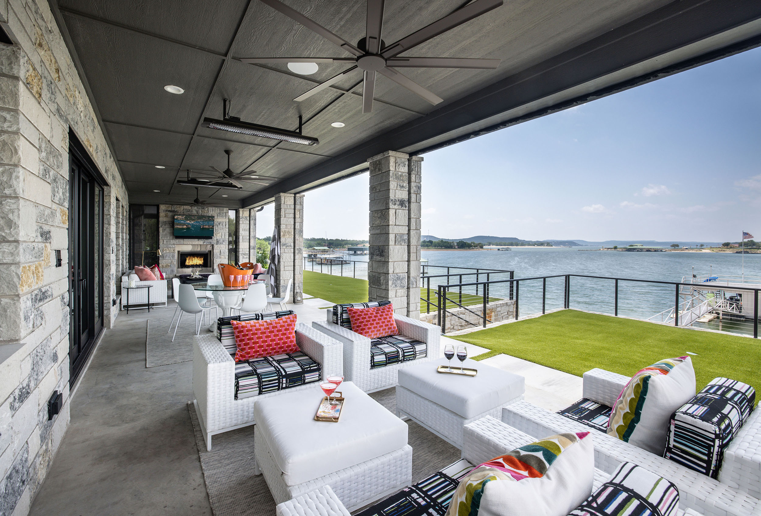 Lake house_Outdoor patio area with custom floorplan and furniture in whole home renovation in second home vacation property in Possum Kingdom Lake Texas