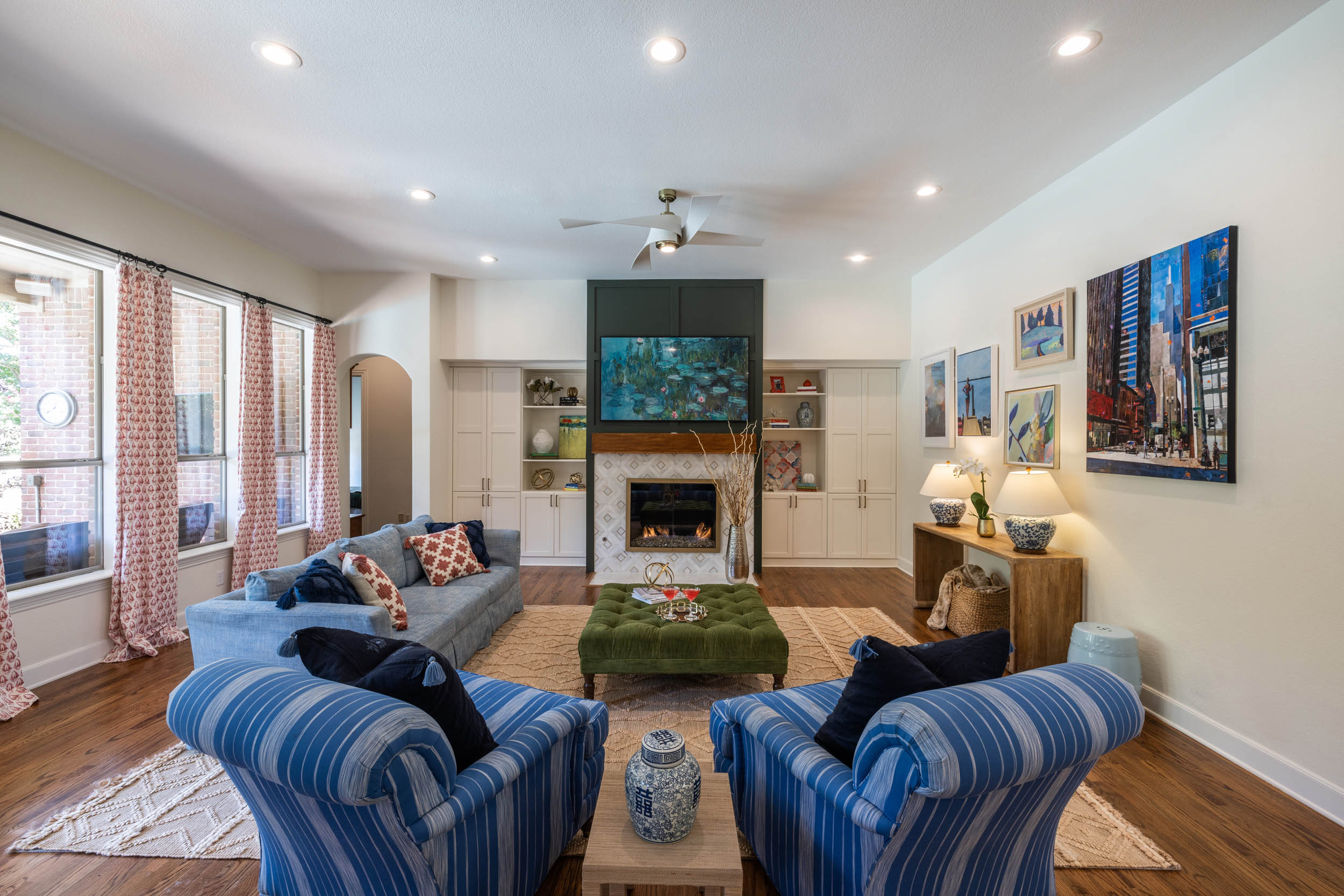 Skiermont_Family room adjacent to kitchen in whole home renovation with custom window coverings and custom floorplan in Southlake Texas